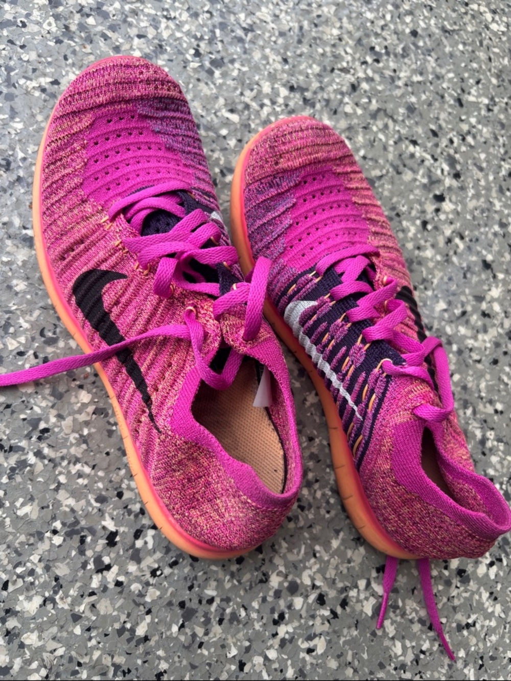 Nike Pink Flyknit Running Shoes
